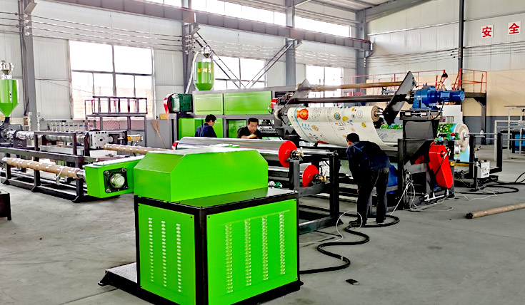 La máquina laminadora por extrusión